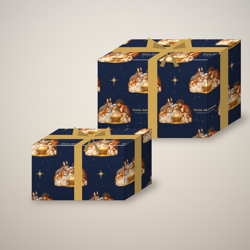 Venite Adoremus nativity Christmas wrapping paper on two wrapped gift boxes with a bow
