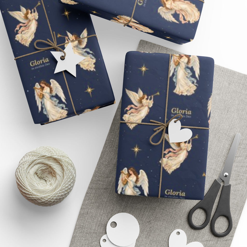 Gloria angel wrapping paper on a wrapped Christmas gift