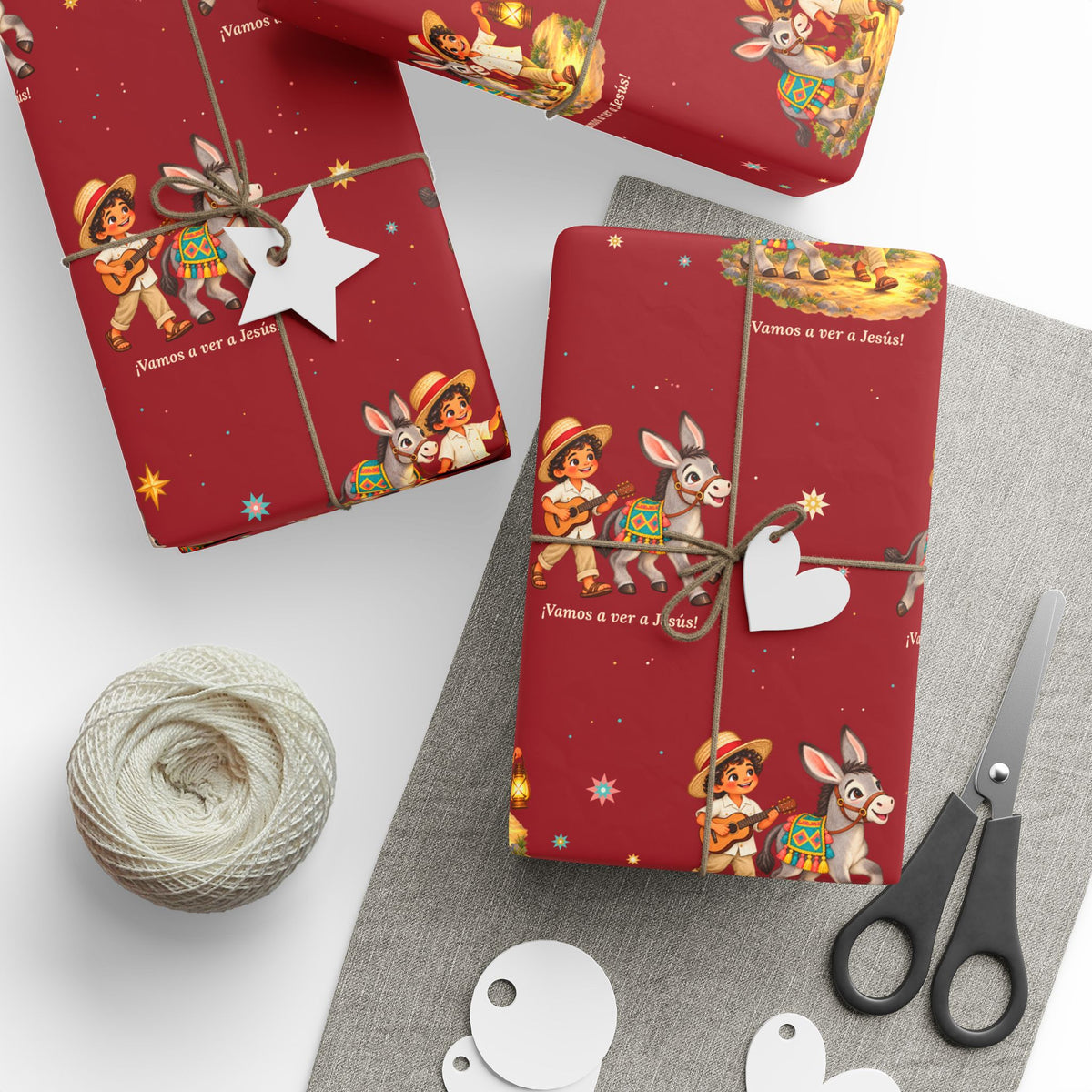 Burrito Navideño Christmas wrapping paper in red with ¡Vamos a ver a Jesús!